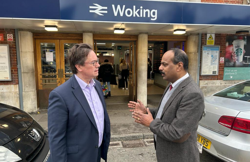 Jonathan Lord MP at Woking Railway Station with a Constituent 